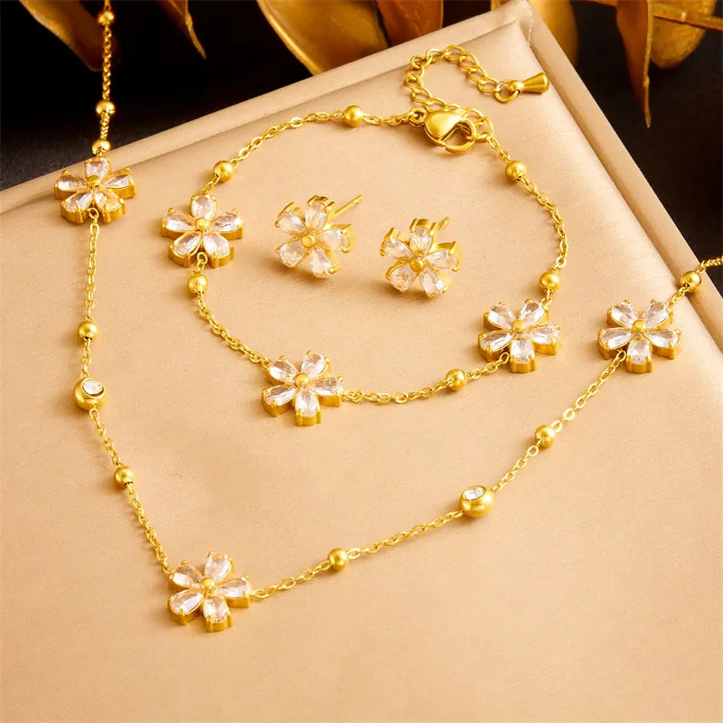 Parure florale dorée 3 pièces — collier bracelet boucles d'oreilles strass